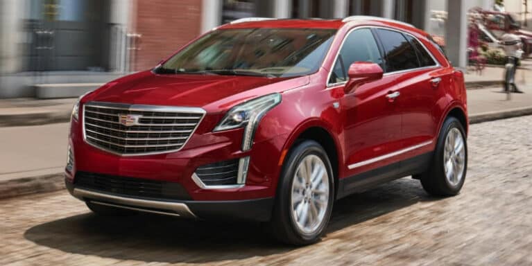 image of a red Cadillac SUV